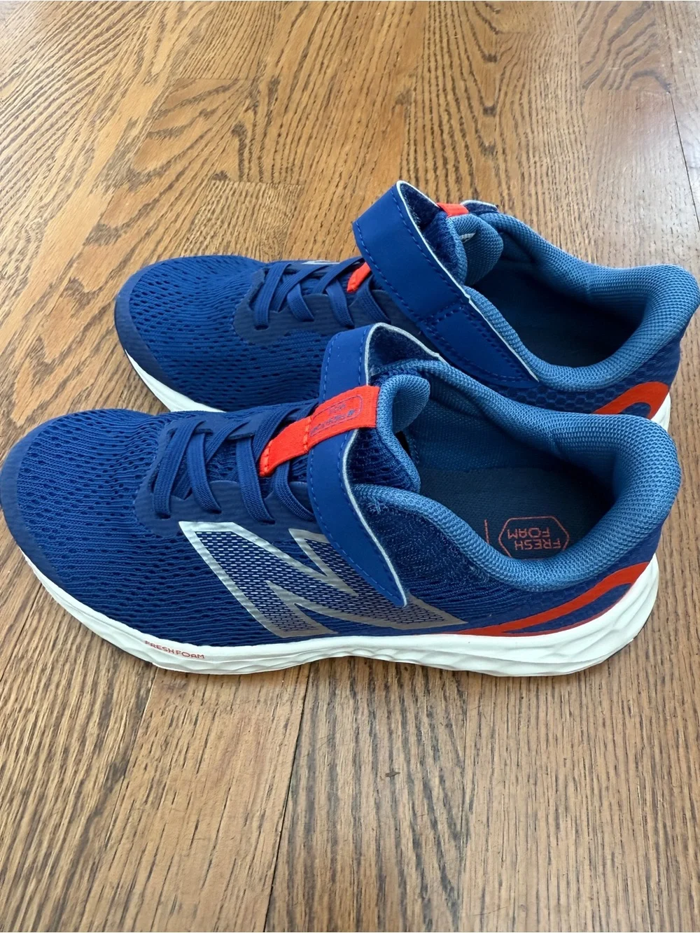 Brand new with tags, without New Balance Kids' Wide Fit Navy & Red Running Shoes